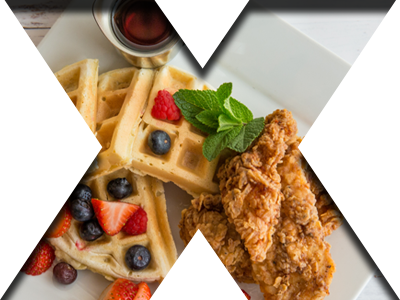 Chicken & Waffles — Homemade Maple Butter Syrup & Fruit | Xaymaca Fried chicken and waffles with homemade maple butter syrup, and fresh fruit