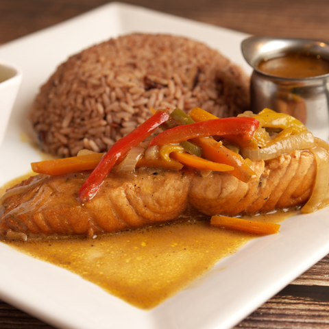 Click to view full image of brown stew salmon with rice and peas Brown stew salmon served with rice and peas – thumbnail view