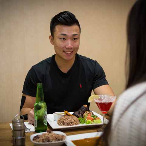 Click to view full image of a couple having a romantic date A couple enjoying a date at a cozy restaurant – thumbnail view