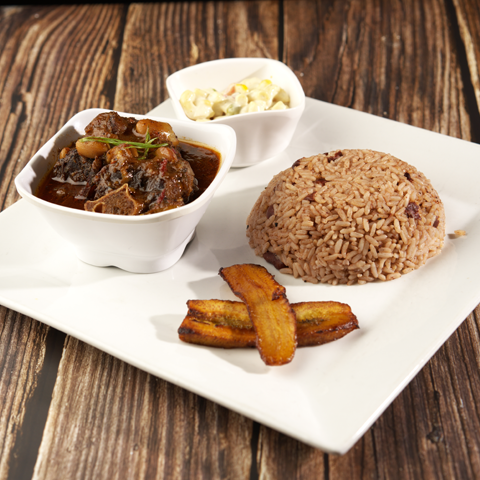 Click to view full image of oxtail with rice and peas, plantain, and macaroni salad Oxtail with rice and peas, plantain, and macaroni salad – thumbnail view
